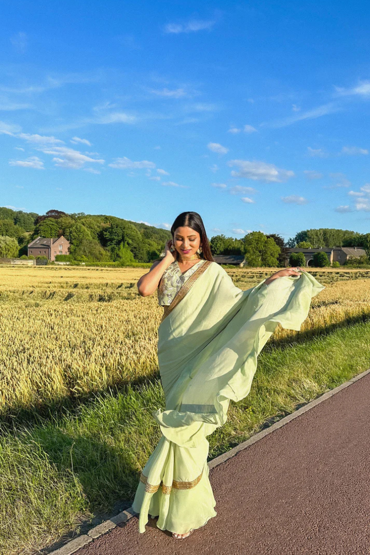 Ruffled Chiffon Saree and Exquisite Silk Blouse with Collar Embellishments