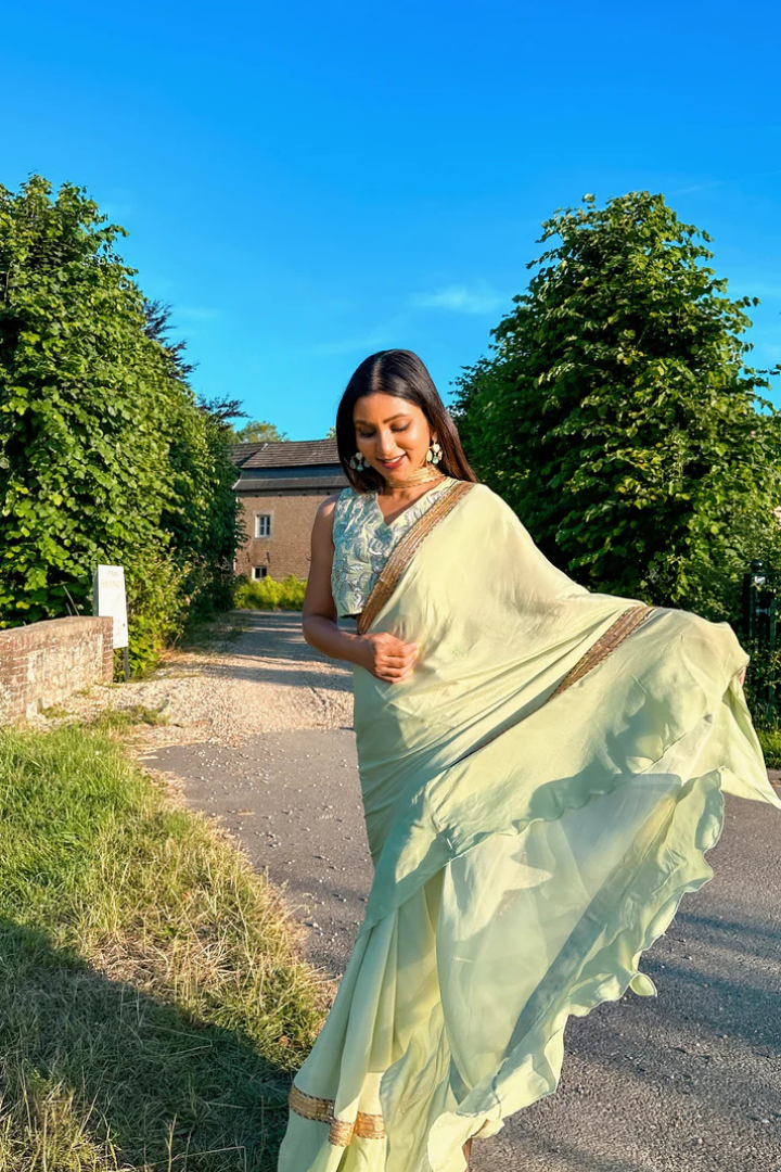 Ruffled Chiffon Saree and Exquisite Silk Blouse with Collar Embellishments