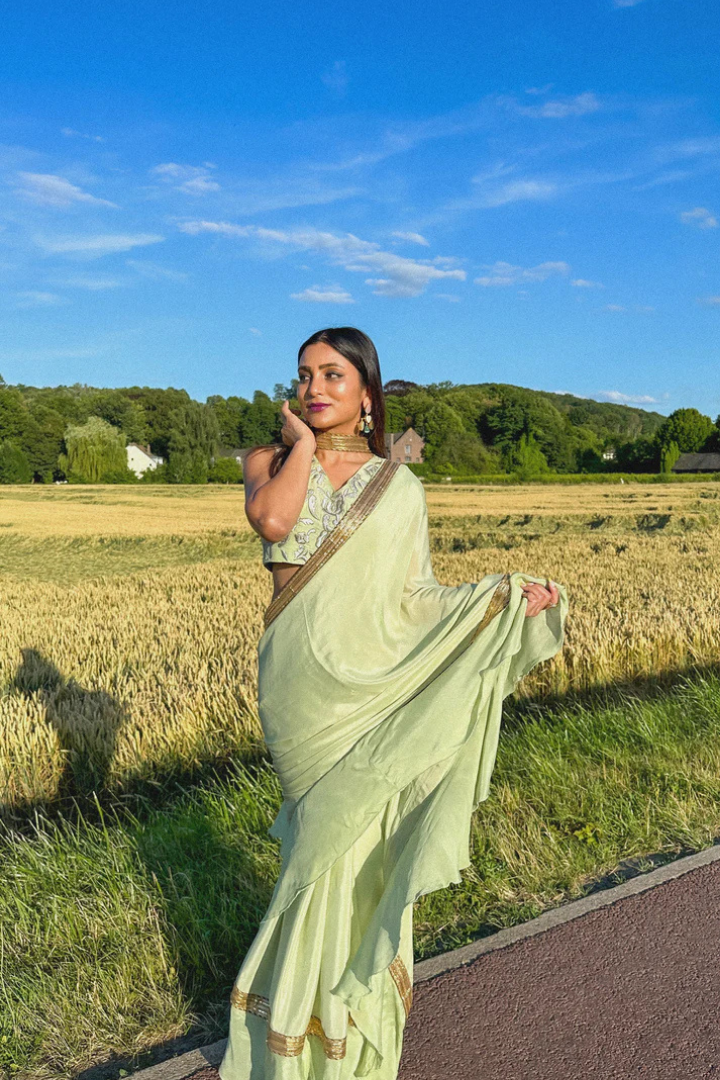 Ruffled Chiffon Saree and Exquisite Silk Blouse with Collar Embellishments